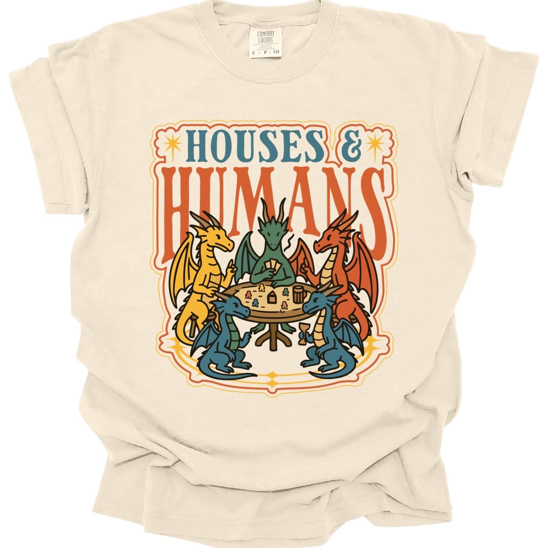 The same Houses and Humans dragons at game night design, on an ivory t-shirt.