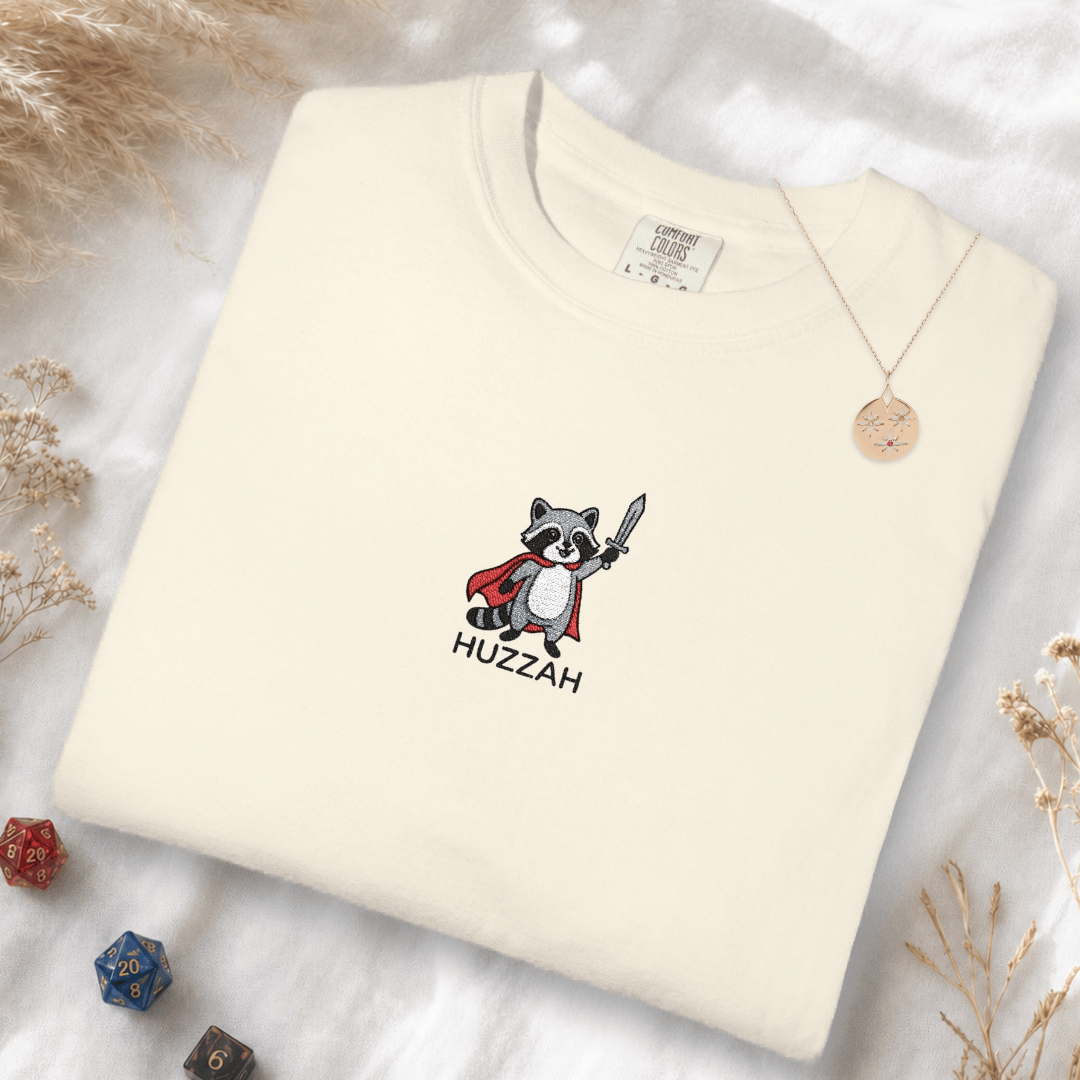Printify T-Shirt Ivory / S Huzzah Raccoon Embroidery T-Shirt - Comfort Colors