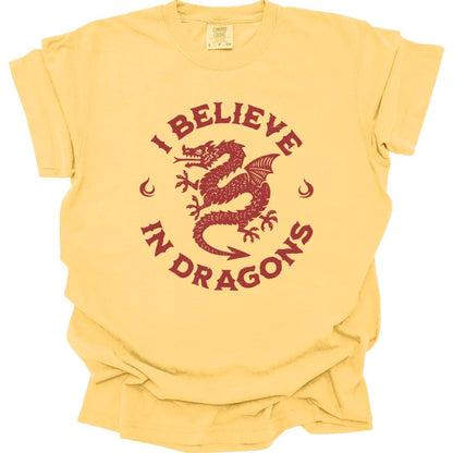 The same I Believe in Dragons design, on a butter t-shirt.
