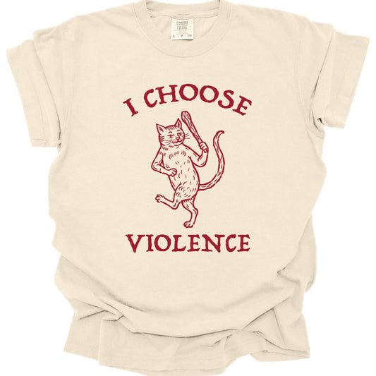 Ivory t-shirt. Reads "I choose" curving across the top and "Violence" across the bottom in red capitals. Between them a cat stands upright on its hind legs with one paw raised mid-swipe, drawn in fine red engraved linework.
