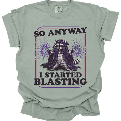 The same I Started Blasting raccoon design, on a bay t-shirt.