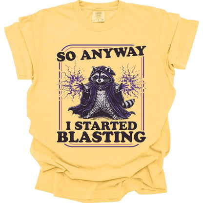 The same I Started Blasting raccoon design, on a butter t-shirt.