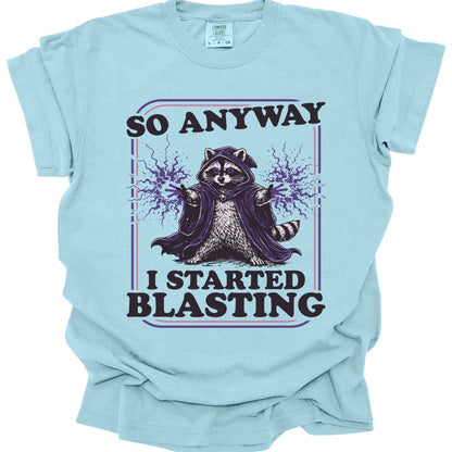 The same I Started Blasting raccoon design, on a chambray t-shirt.