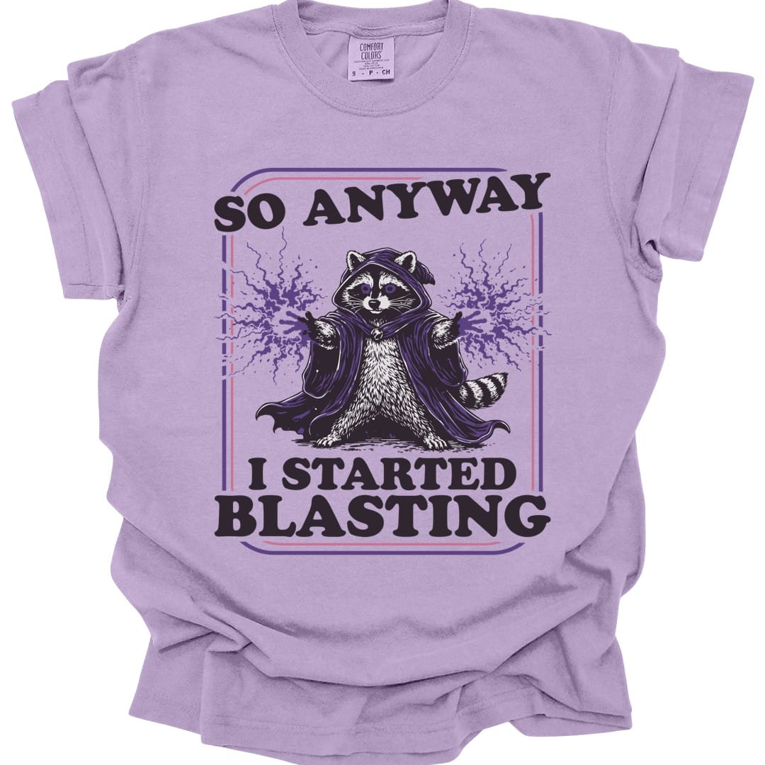 The same I Started Blasting raccoon design, on an orchid t-shirt.