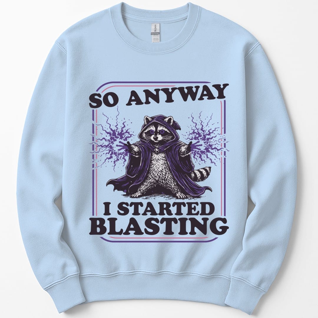 The same I Started Blasting raccoon design, on a light blue sweatshirt.