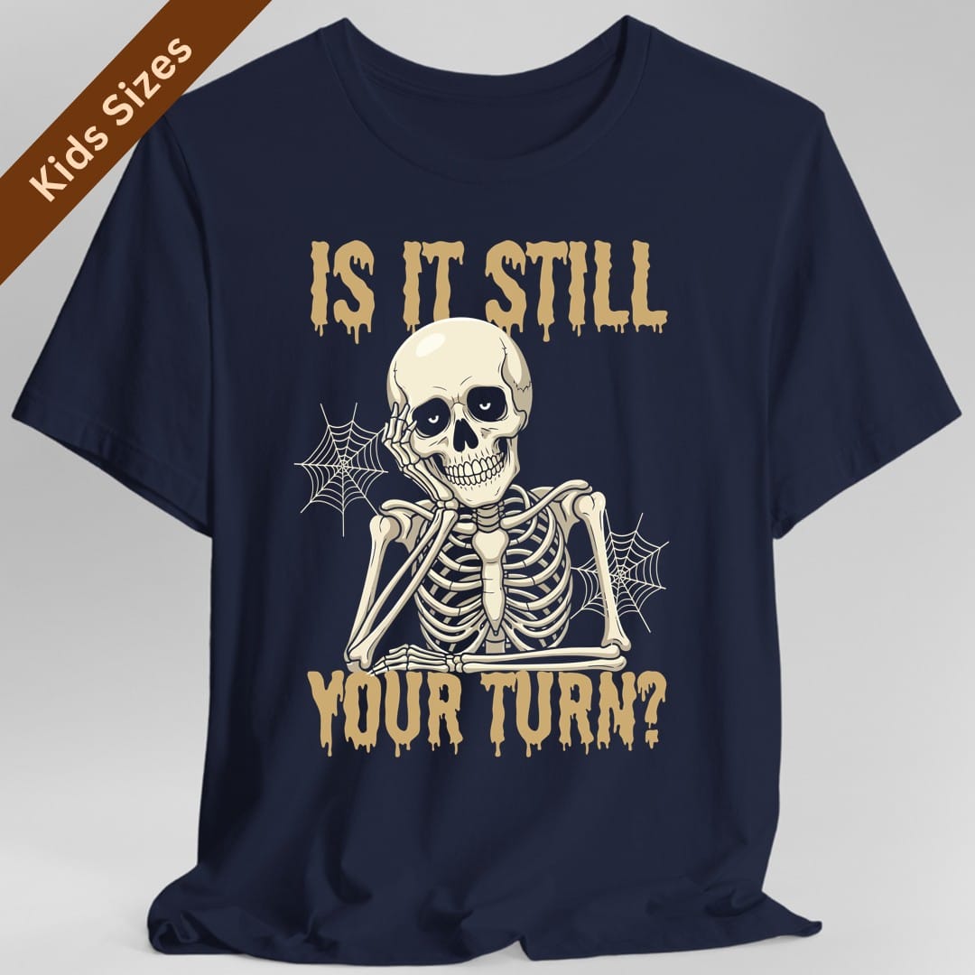 The same Is It Still Your Turn skeleton design, on a navy kids t-shirt.