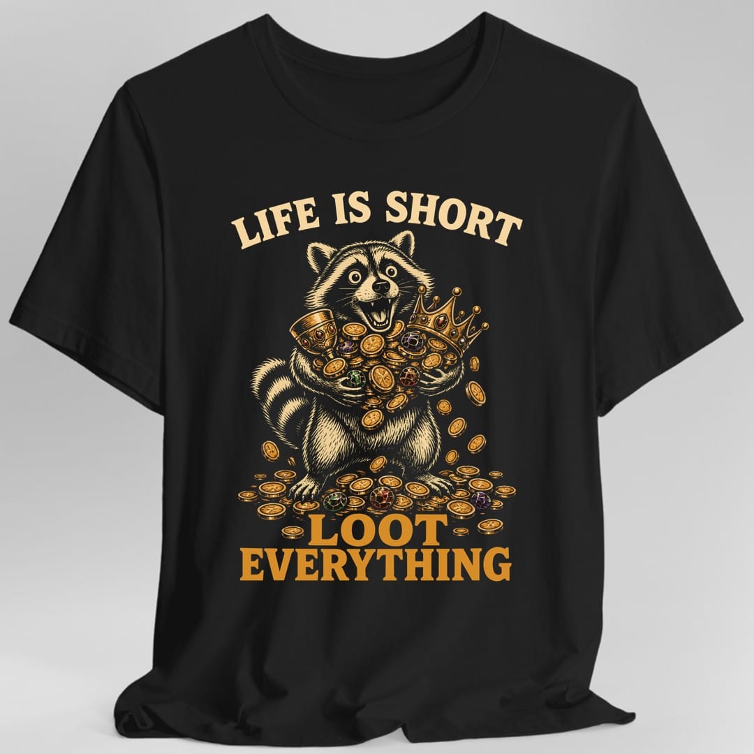 Black t-shirt. The design reads "LIFE IS SHORT" curved across the top and "LOOT EVERYTHING" in two big gold lines at the bottom. In the middle a raccoon sits wide eyed with its mouth open, hugging an enormous armful of gold coins, jeweled goblets, a crown and colored gems, with more coins tumbling out and piling up around its feet. Drawn as a detailed cream and gold engraving with pops of green, red and purple.