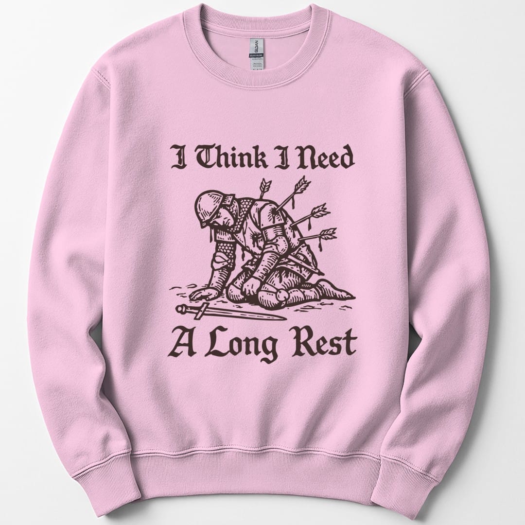 The same Long Rest knight design, on a light pink sweatshirt.