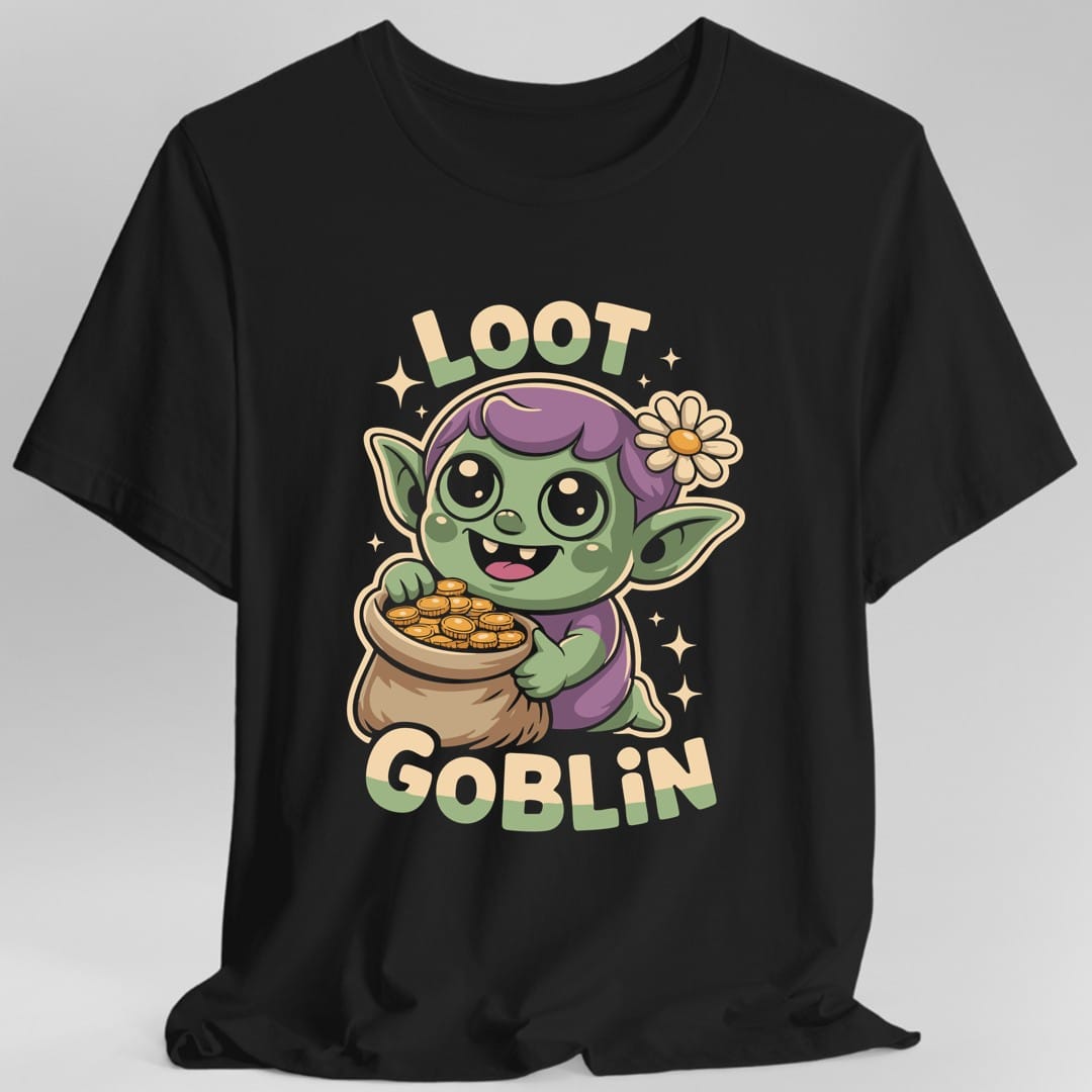Black t-shirt. Reads "Loot" across the top and "Goblin" across the bottom in chunky cream capitals. Between them a green goblin with purple hair and a daisy behind its ear grins while hugging a sack overflowing with gold coins. Soft cartoon style with sparkles.