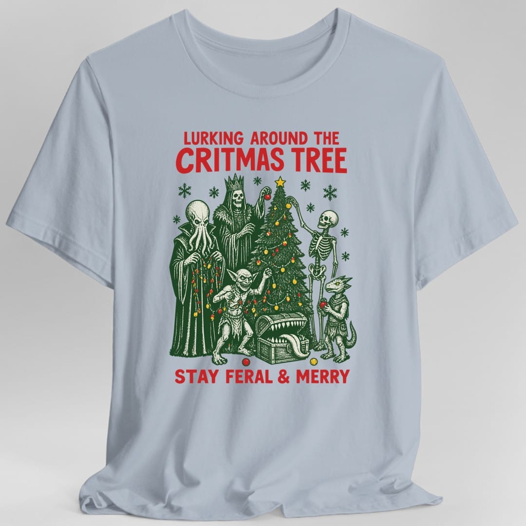 The same Lurking Around the Critmas Tree design, on a light blue t-shirt.