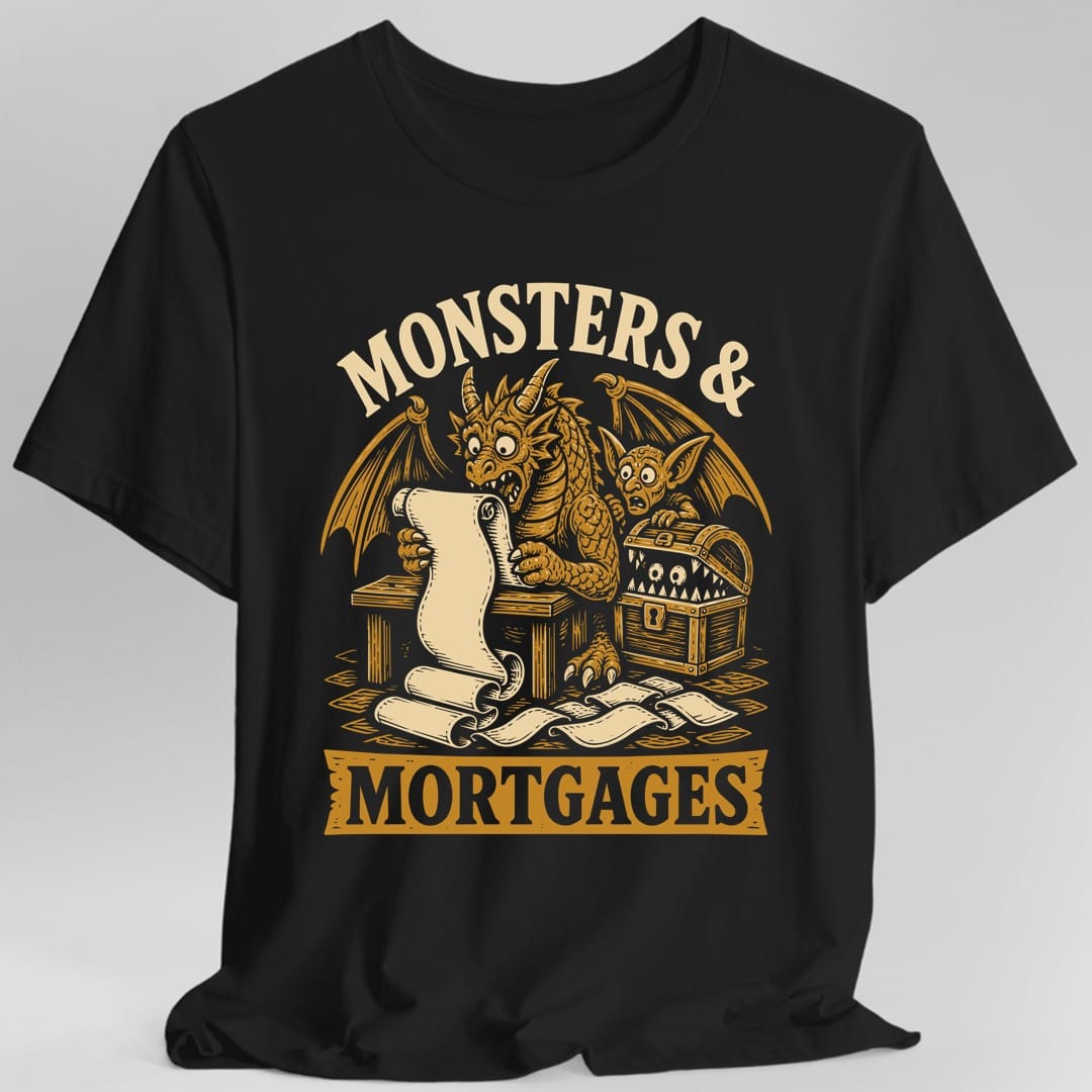 Black t-shirt. The design reads Monsters and Mortgages, the first part arched across the top and the second in black letters on a gold banner below. Between them a wide-eyed dragon at a small table holds a long unrolled bill that spills onto the floor, a goblin with big pointed ears peers over its shoulder in shock, and a treasure chest with teeth and eyes sits beside them. Gold and cream woodcut.