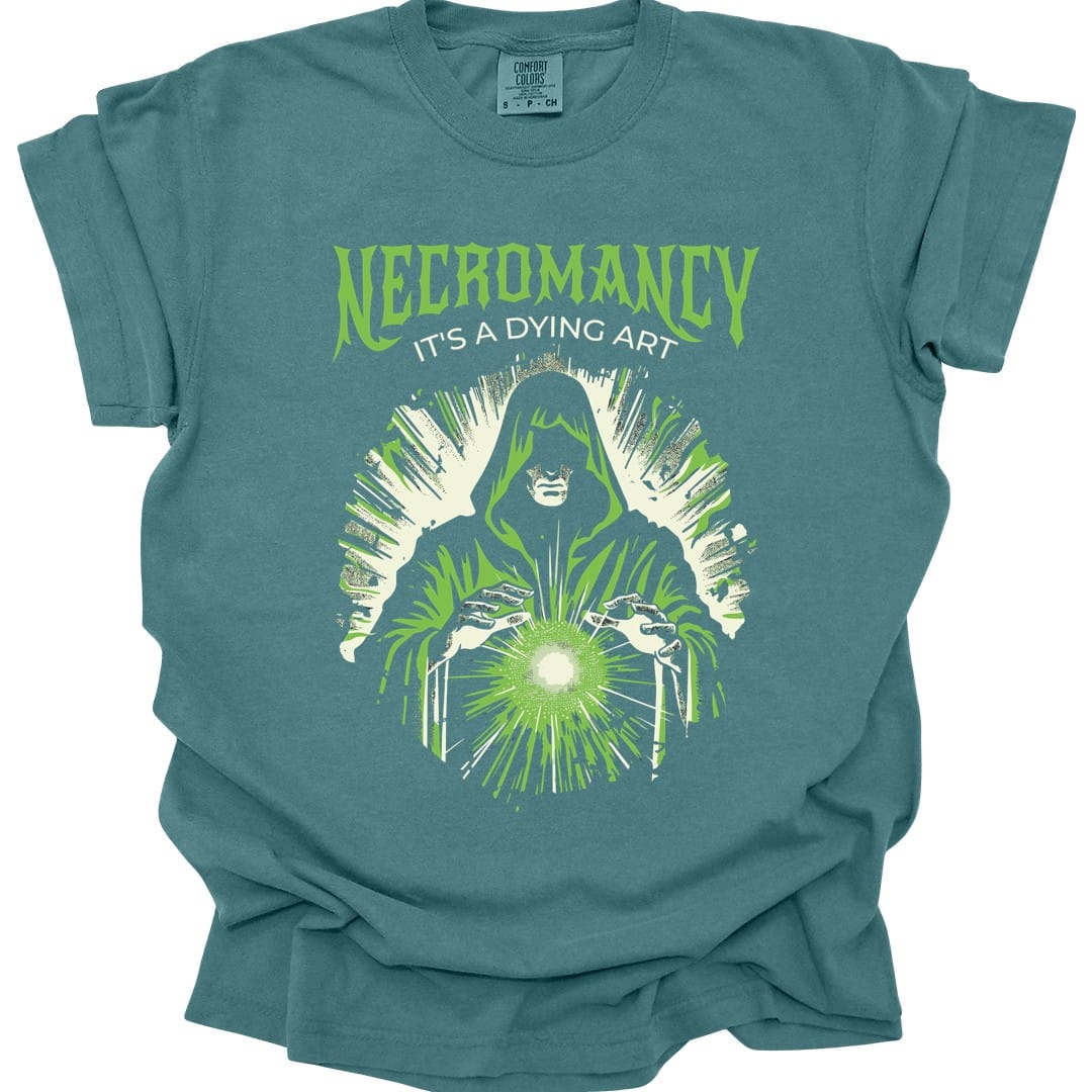 The same Necromancy It's a Dying Art design, on a blue spruce t-shirt.