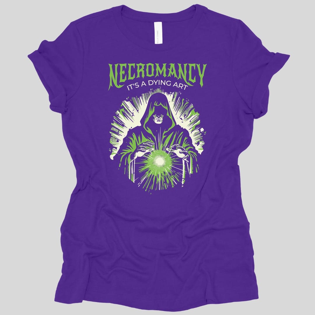 The same Necromancy It's a Dying Art design, on a team purple women's t-shirt.