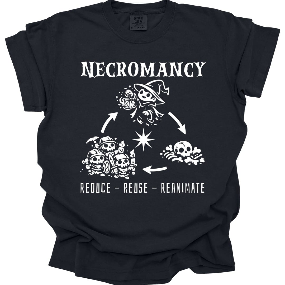 Black t-shirt. Reads "Necromancy" across the top and "Reduce, reuse, reanimate" across the bottom in white capitals. Between them three small scenes sit in a triangle joined by curving arrows: a hooded necromancer casting, a group of skeletons carrying jars, and a pile of bones. Fine white line work.