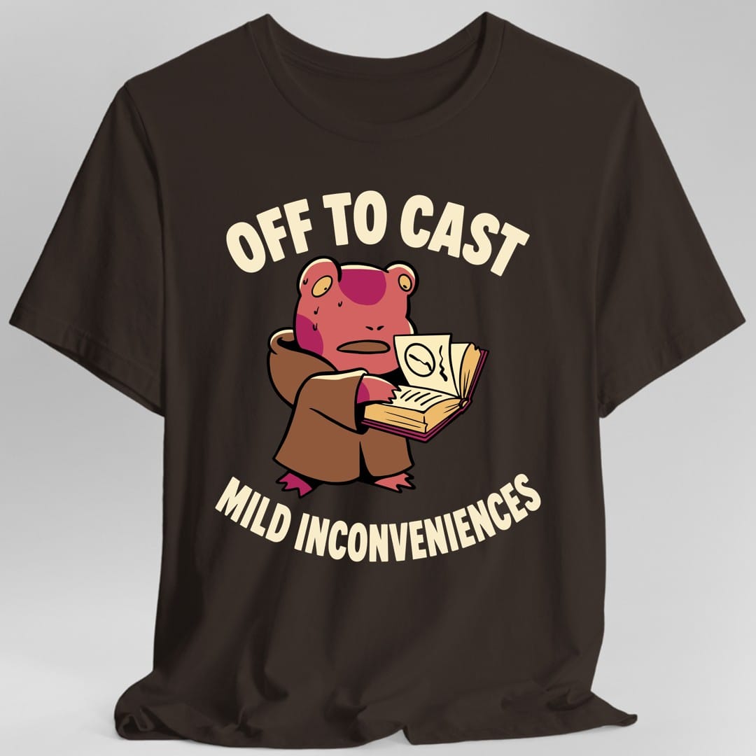 The same Off to Cast Mild Inconveniences design, on a dark chocolate t-shirt.