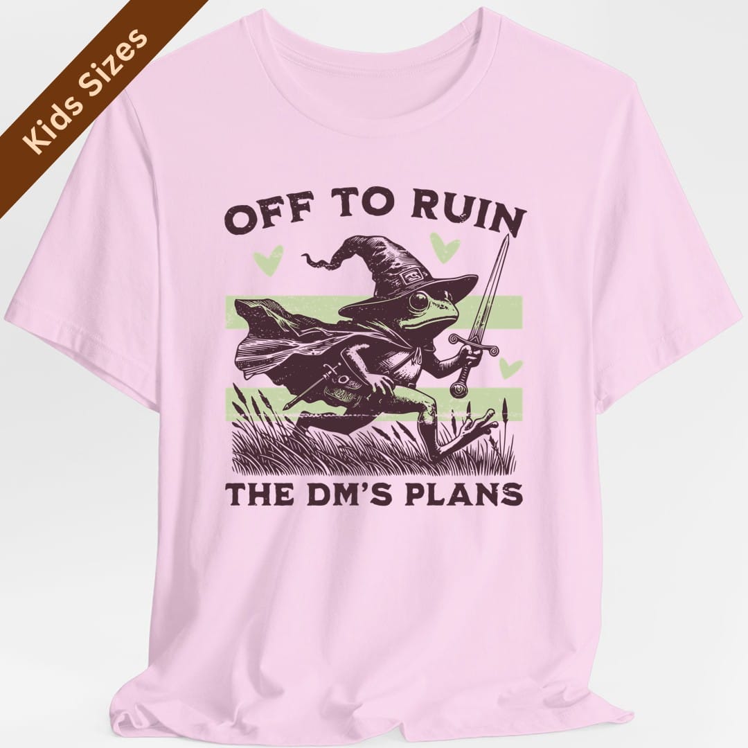 The same Off to Ruin the DM's Plans frog design, on a light pink kids t-shirt.