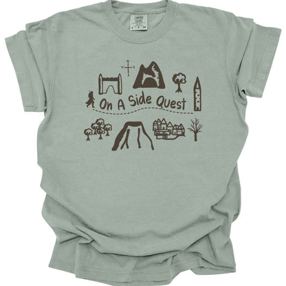The same Side Quest doodle map design, on a bay t-shirt.