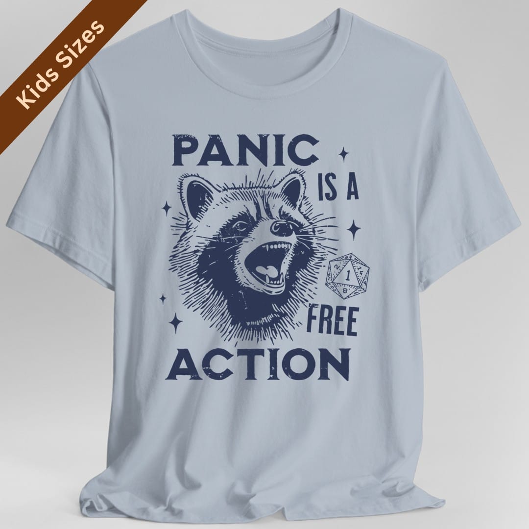The same Panic Is A Free Action raccoon design, on a light blue kids t-shirt.