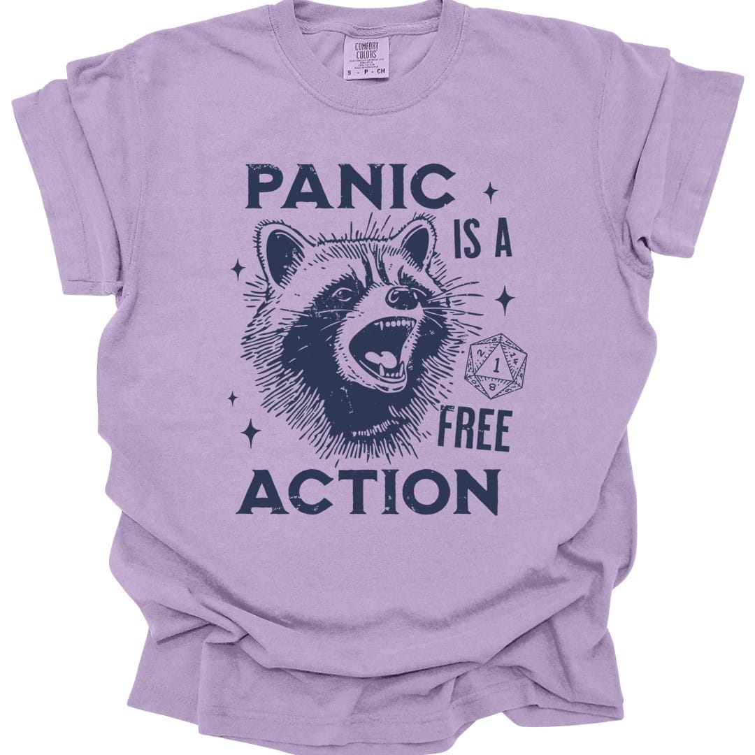 The same Panic Is A Free Action raccoon design, on an orchid t-shirt.