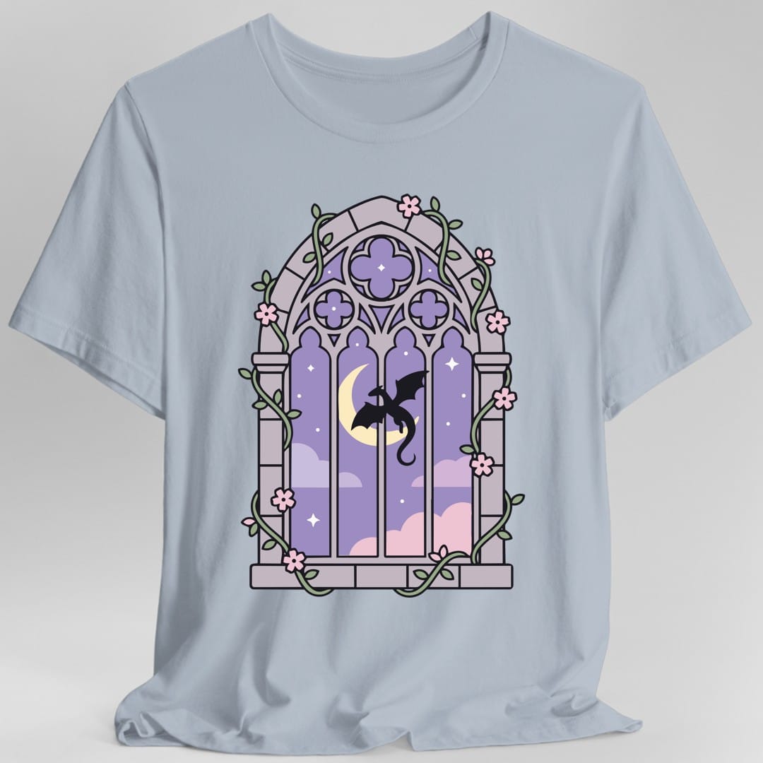 The same Pastel Dragon Window design, on a light blue t-shirt.