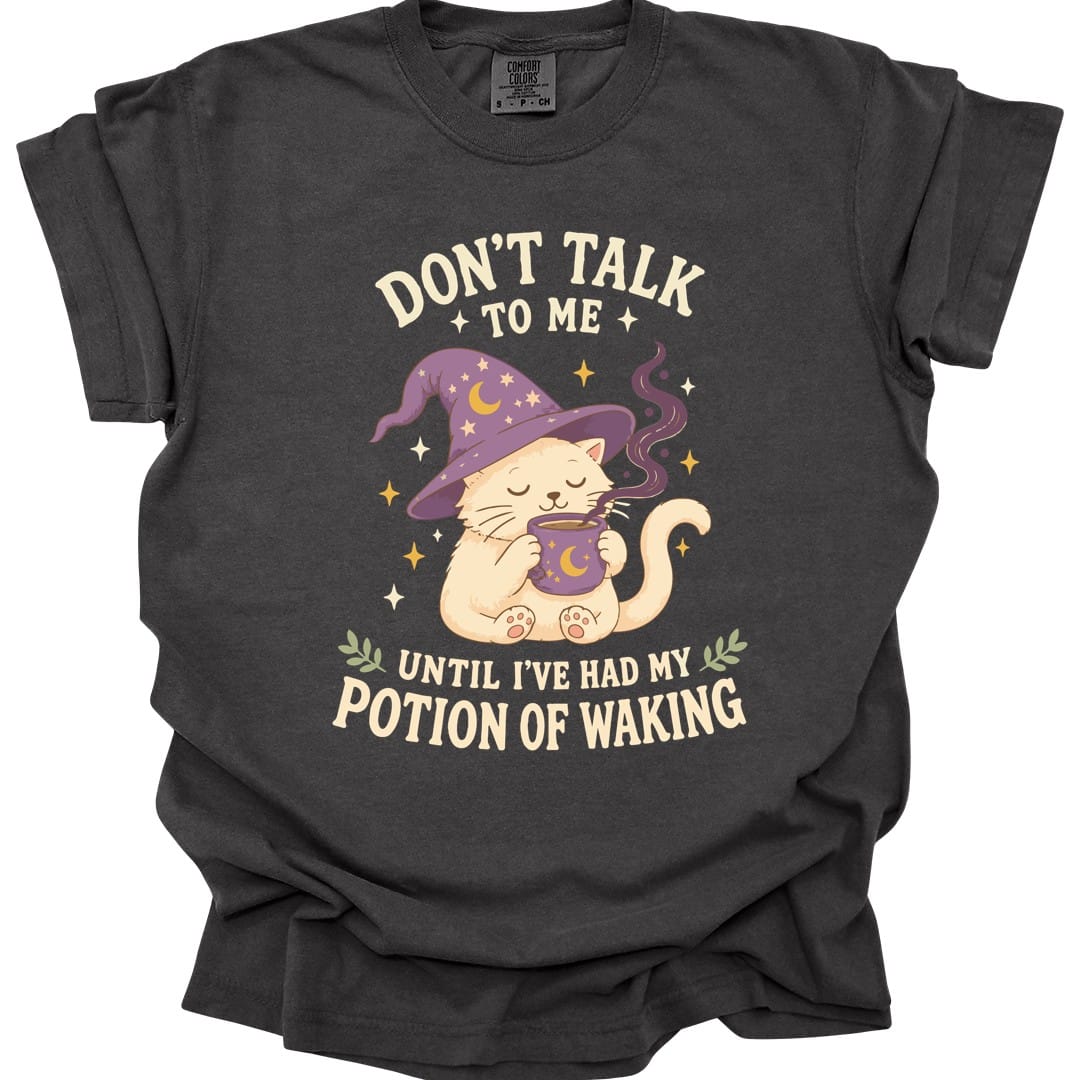 The same Potion Of Waking cat design, on a pepper t-shirt.