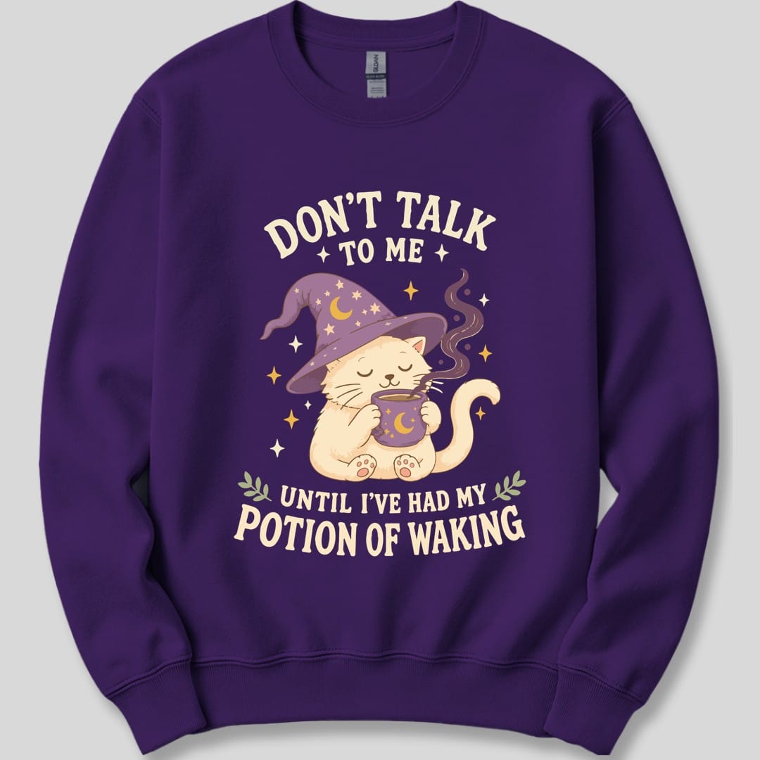 The same Potion Of Waking cat design, on a purple sweatshirt.
