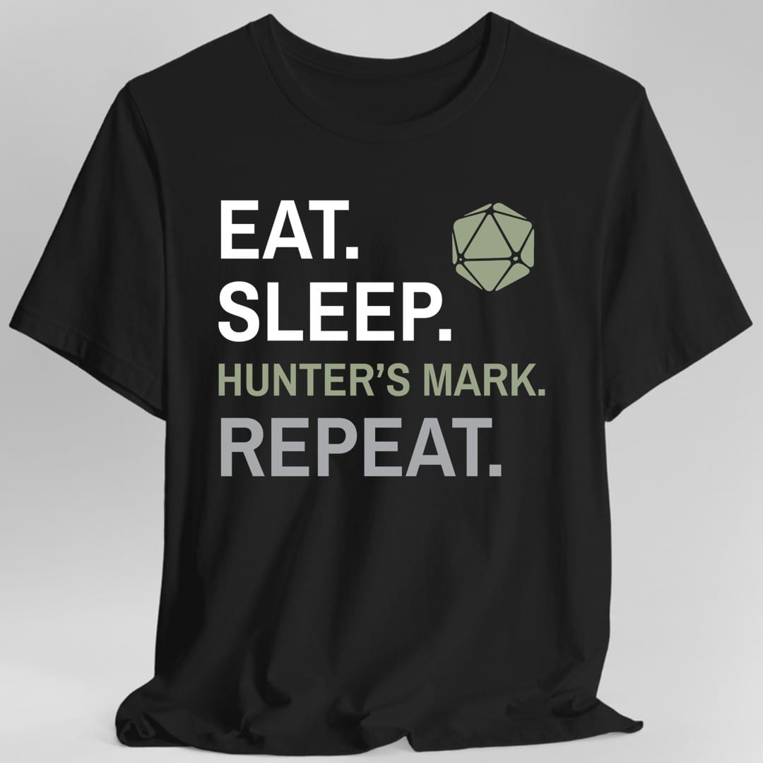 Black t-shirt. Four words stacked in heavy block capitals on four lines: "Eat." and "Sleep." in white, then "Hunter's mark." in olive green, then "Repeat." in gray. A olive green twenty-sided die sits in the top right corner beside the word Eat. All type, no illustration.
