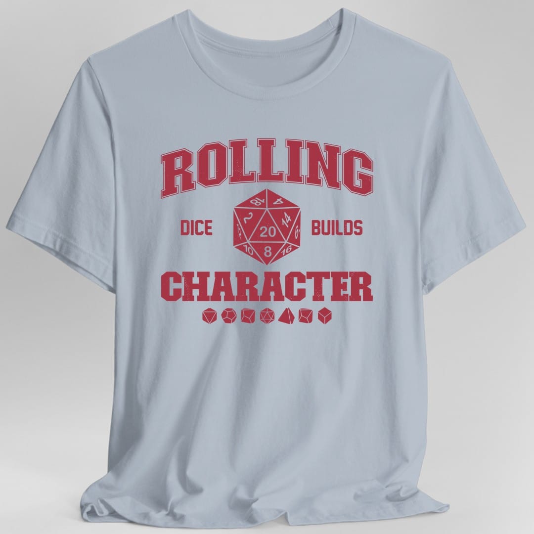 The same Rolling Dice Builds Character design, on a light blue t-shirt.