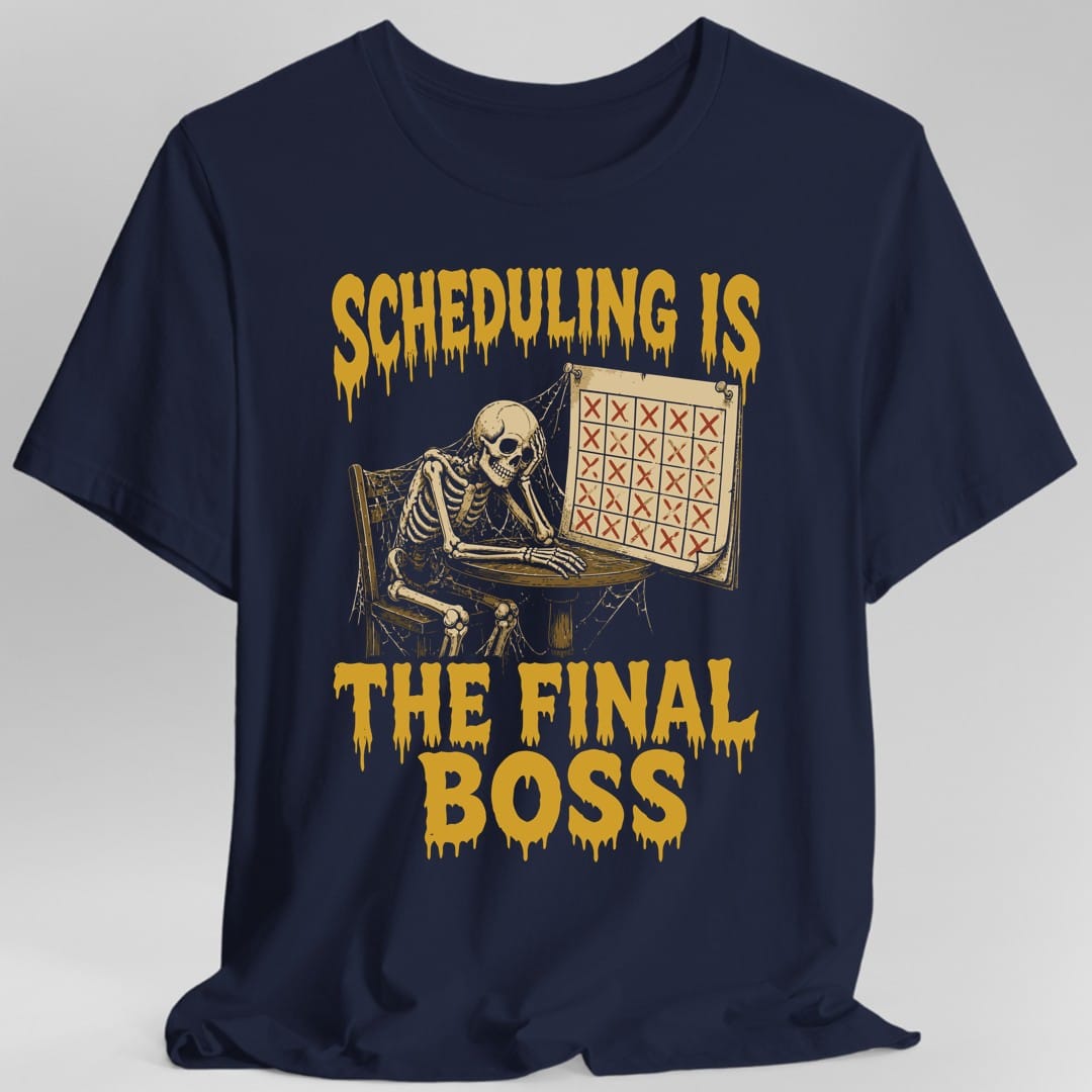 The same Scheduling Is The Final Boss design, on a navy t-shirt.