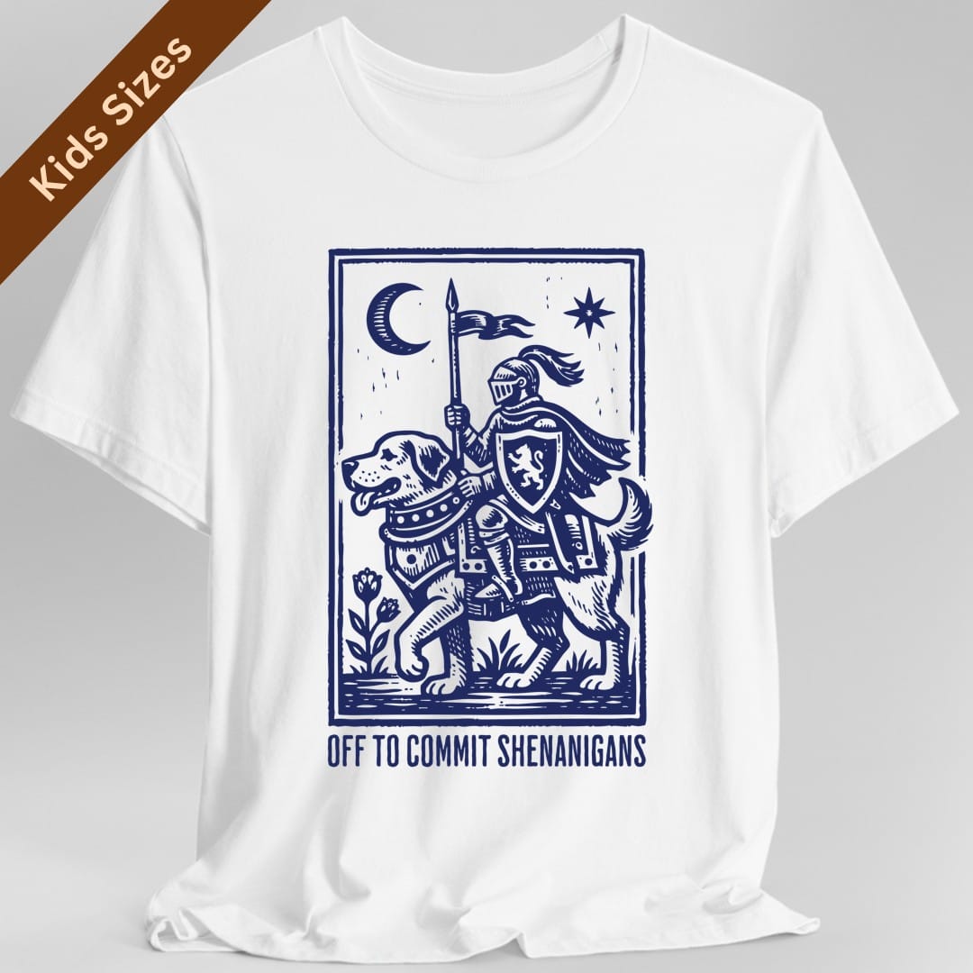 White kids t-shirt. A knight in full armor rides a large hound like a horse, carrying a lance with a pennant, under a crescent moon and a star, all inside a thin ruled border. Underneath, "Off to commit shenanigans" in spaced capitals. Medieval woodcut style, all in one deep blue.