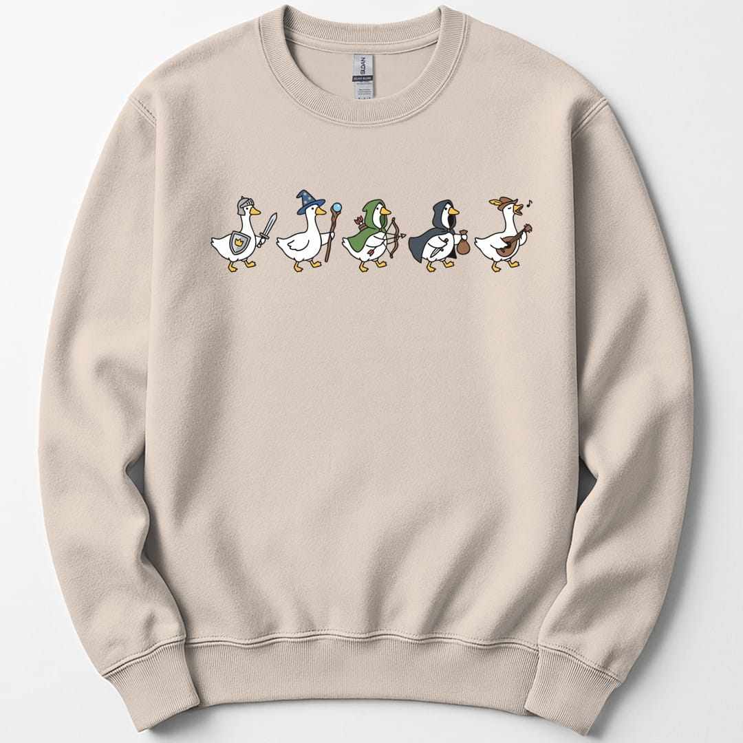 The same Silly Goose Adventurers design, on a sand sweatshirt.