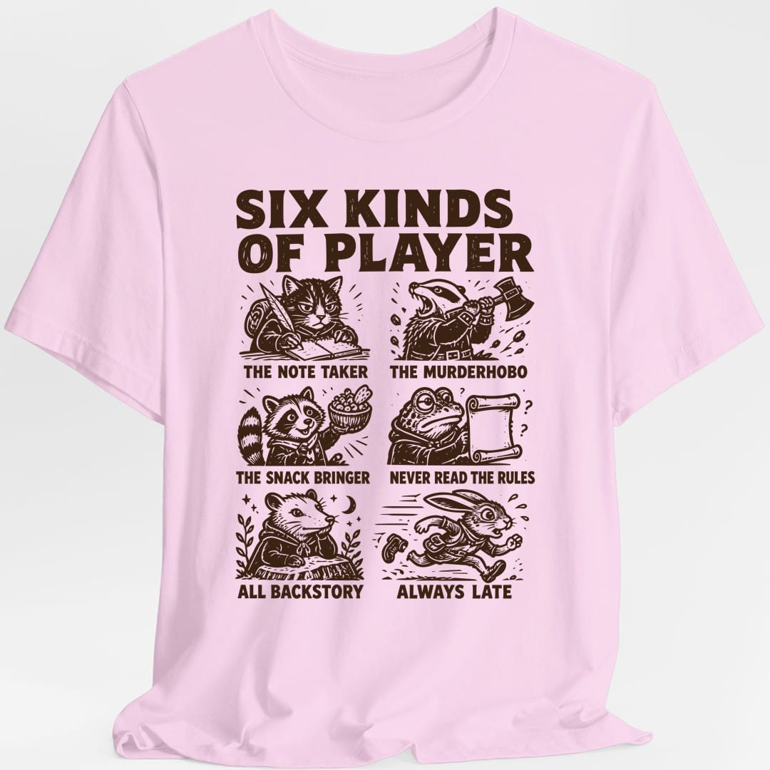The same Six Kinds Of Player grid design, on a light pink t-shirt.