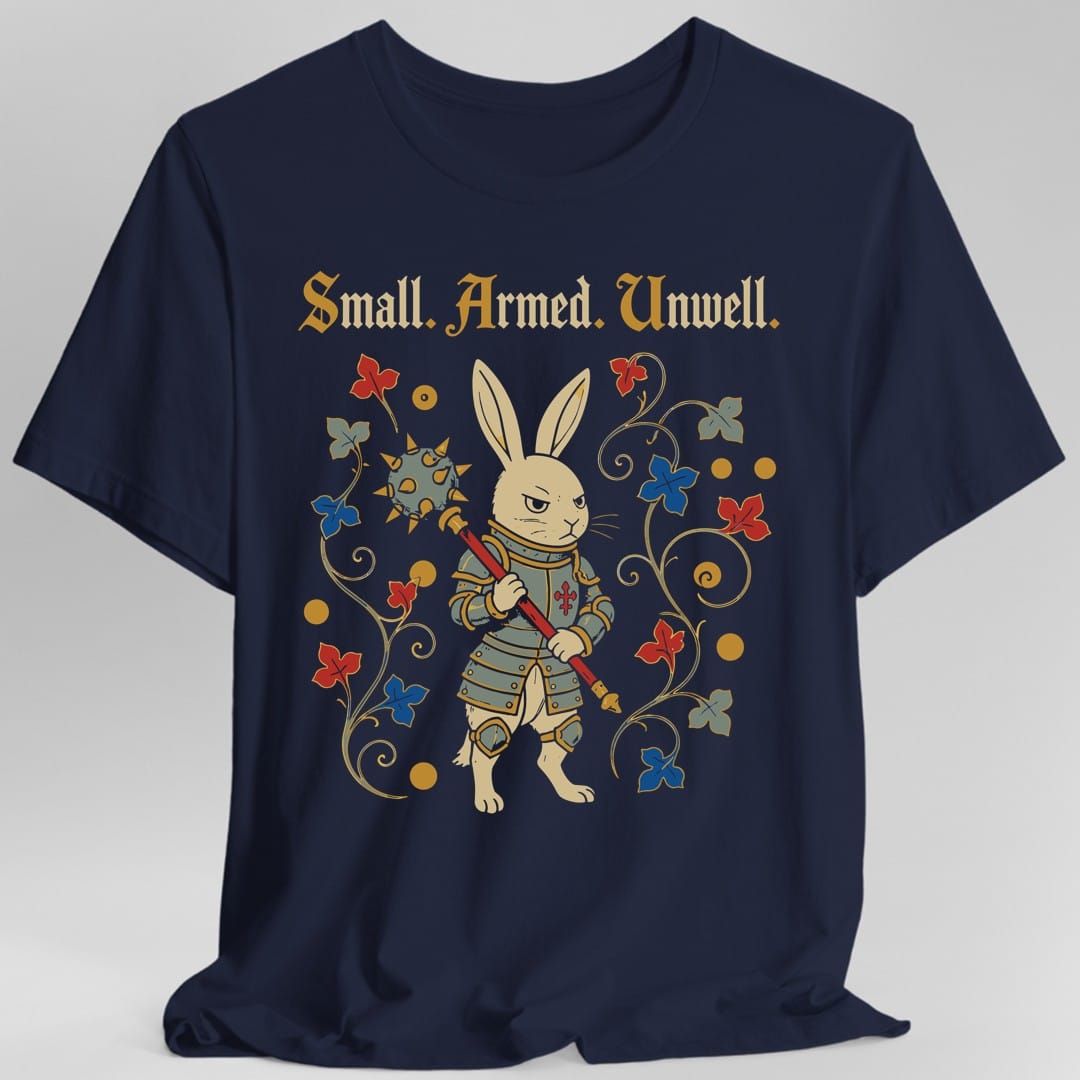 The same Small Armed Unwell rabbit design, on a navy t-shirt.