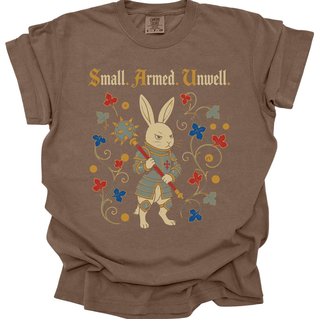 The same Small Armed Unwell rabbit design, on an espresso t-shirt.