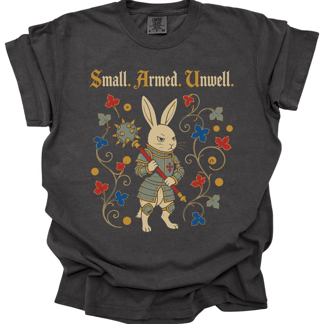 The same Small Armed Unwell rabbit design, on a pepper t-shirt.