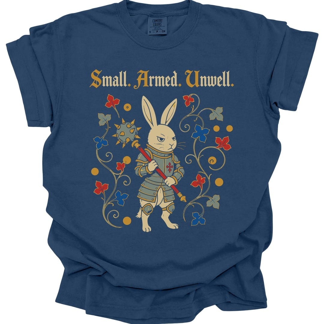 The same Small Armed Unwell rabbit design, on a true navy t-shirt.