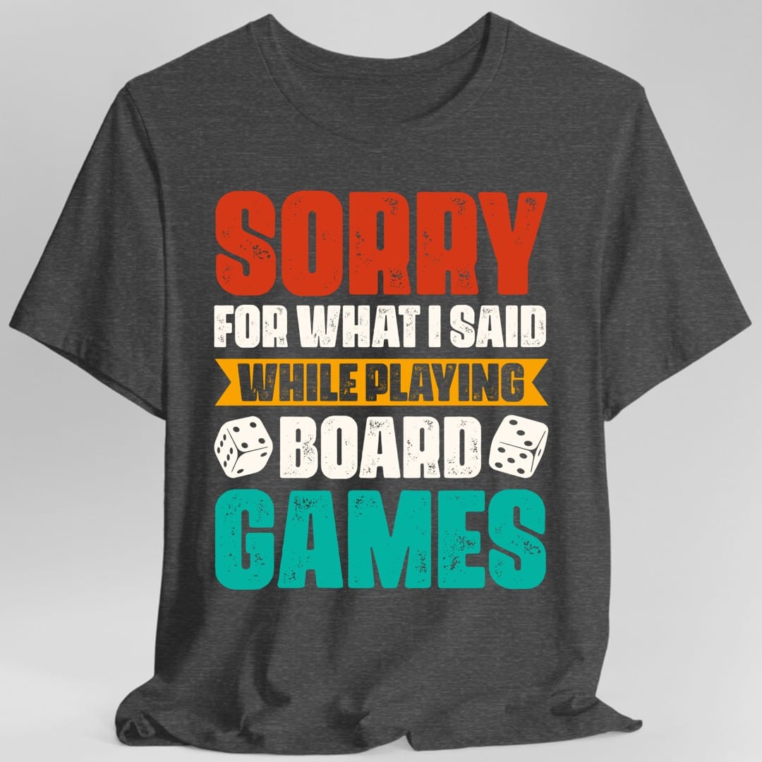 The same Sorry For What I Said board games design, on a dark heather t-shirt.
