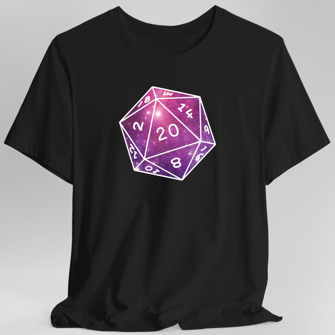 Black t-shirt. A single large twenty-sided die showing 20, its faces filled with a purple and pink star nebula scattered with white stars, outlined in white with the numbers marked. No words at all.