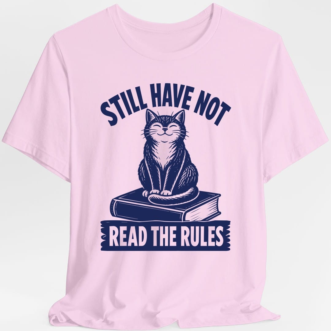 The same Still Have Not Read The Rules cat design, on a light pink t-shirt.