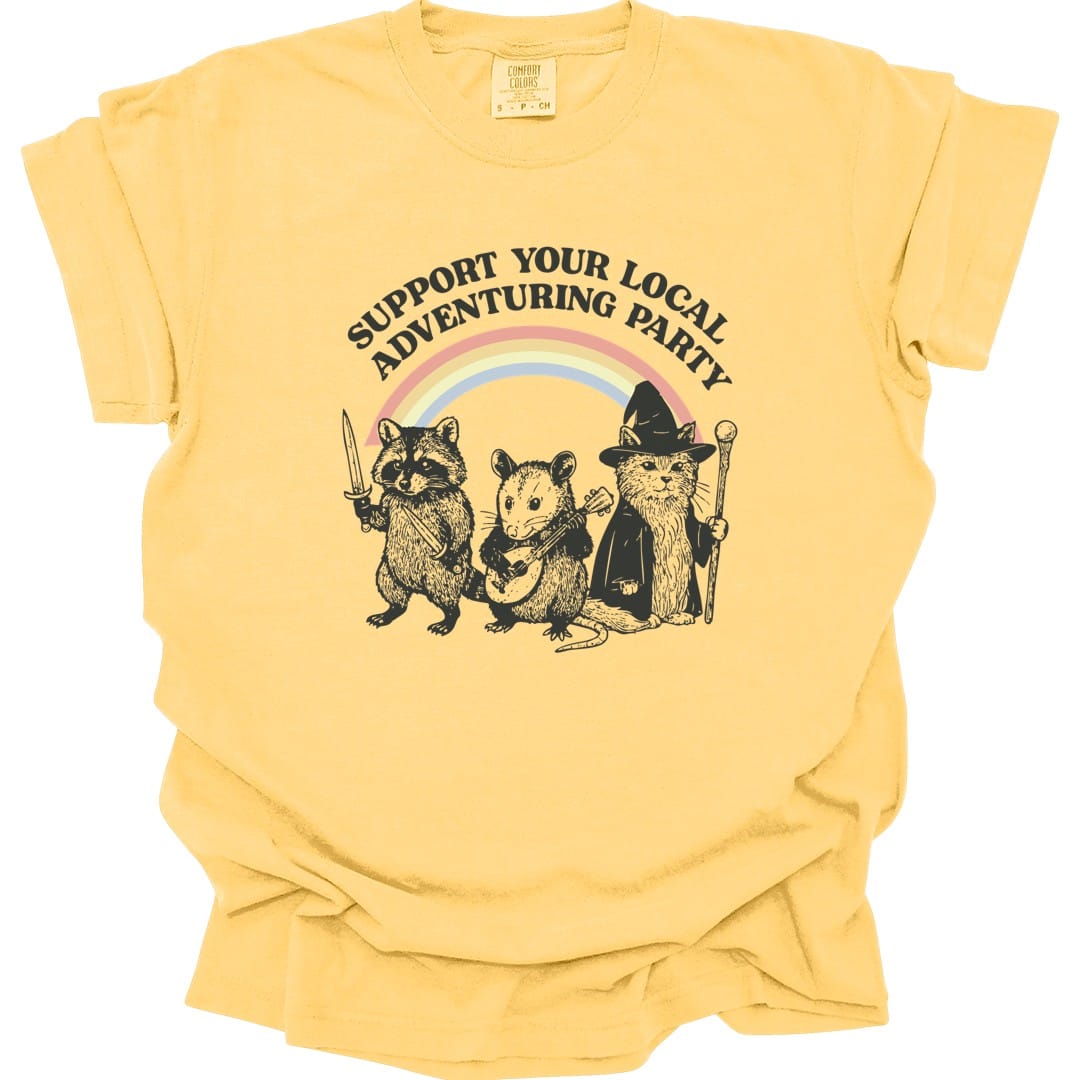 The same Support Your Local Adventuring Party design, on a butter t-shirt.