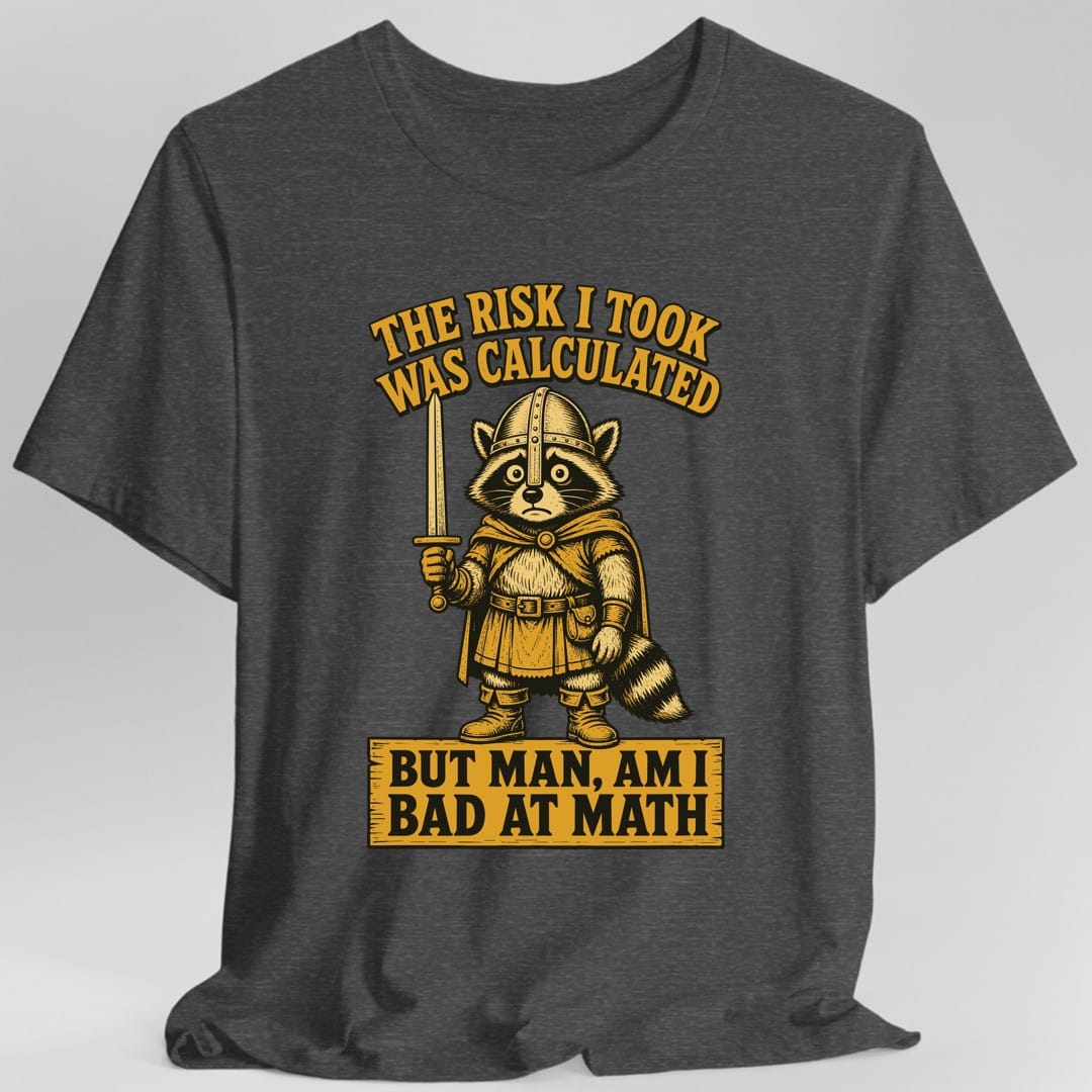 The same Risk Was Calculated raccoon design, on a dark heather t-shirt.