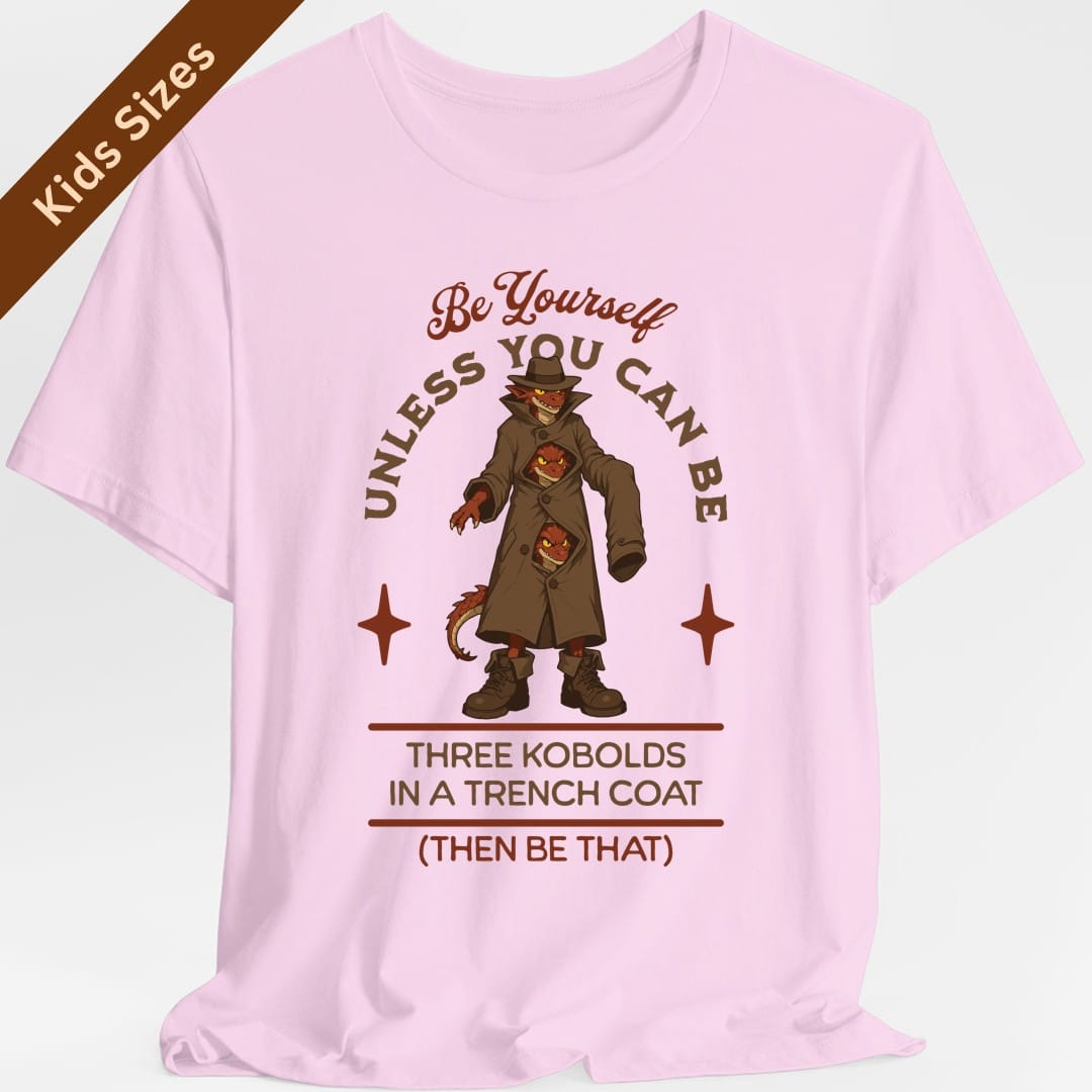 The same Three Kobolds in a Trench Coat design, on a light pink kids t-shirt.