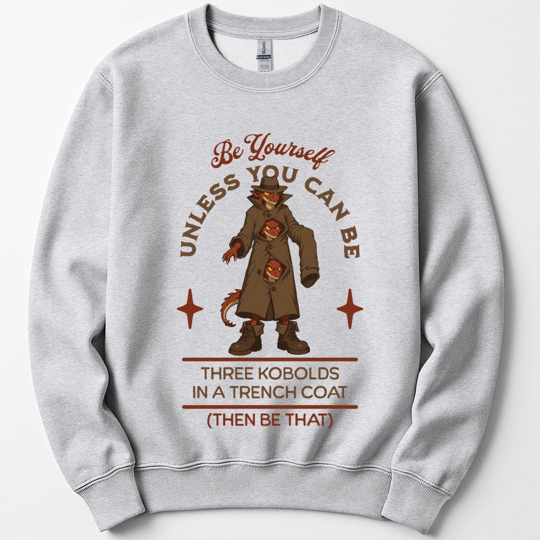 The same Three Kobolds in a Trench Coat design, on an ash sweatshirt.