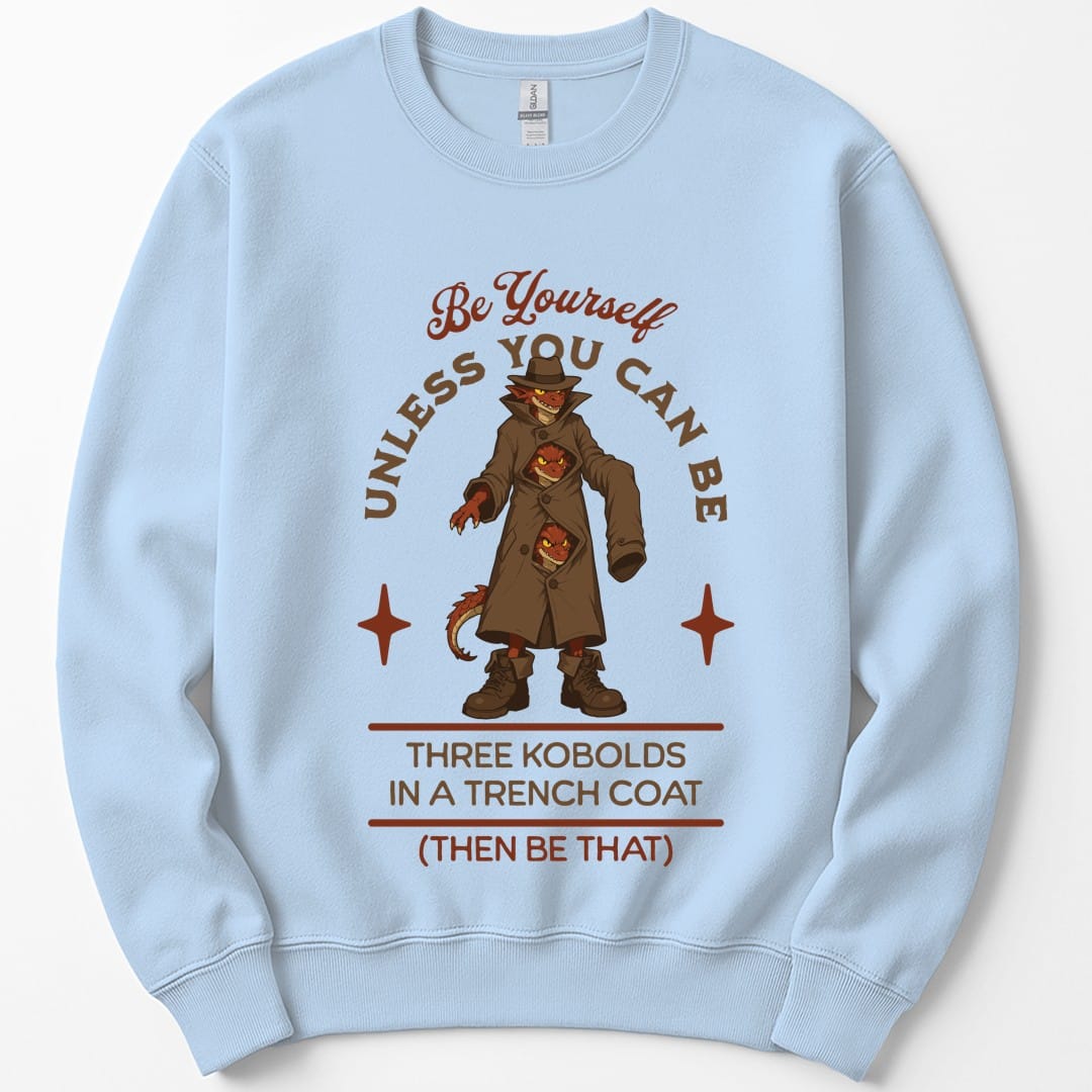 The same Three Kobolds in a Trench Coat design, on a light blue sweatshirt.