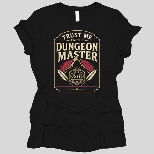 Black women's t-shirt. A tall cream badge with a ruled border. "Trust me" sits at the top, then "Dungeon Master" in large capitals. Below, a hooded figure looms behind a twenty-sided die showing 20, flanked by two quill feathers, with a dark red fan behind the hood. Vintage badge style in cream and deep red.
