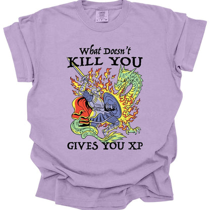 The same What Doesn't Kill You Gives You XP knight design, on an orchid t-shirt.