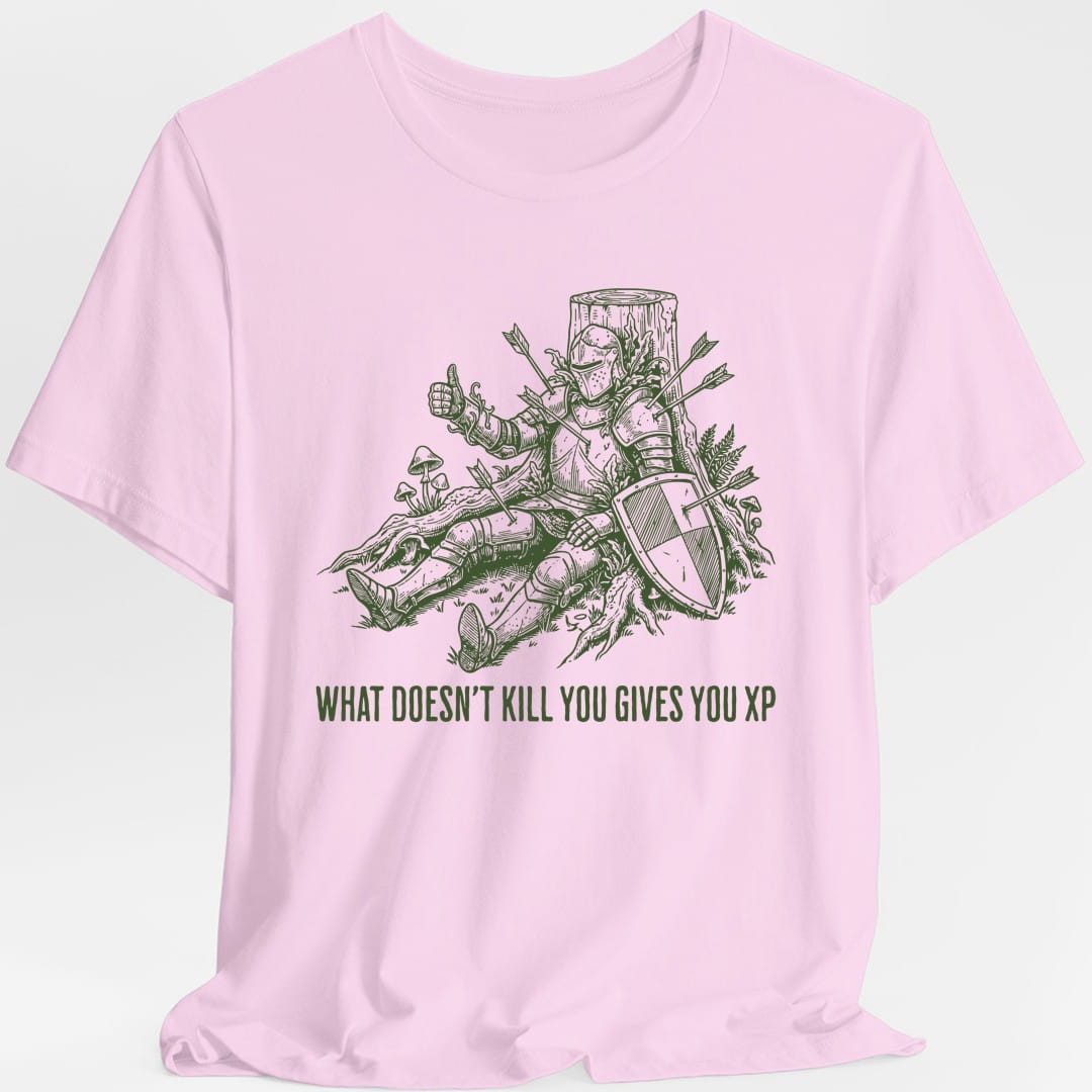 The same What Doesn't Kill You Gives You XP knight design, on a light pink t-shirt.