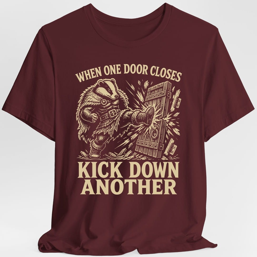 The same Kick down another badger design, on a maroon t-shirt.